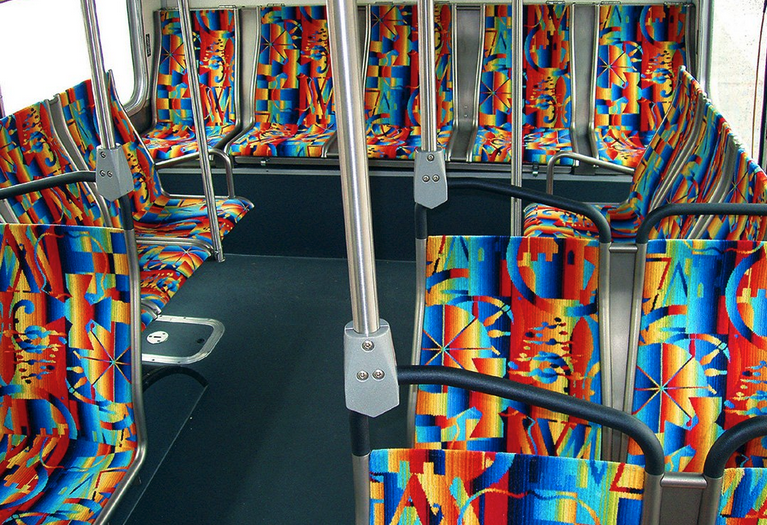 a colorful seats on a bus