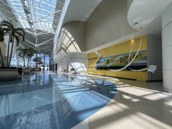 a large hall with a train in it