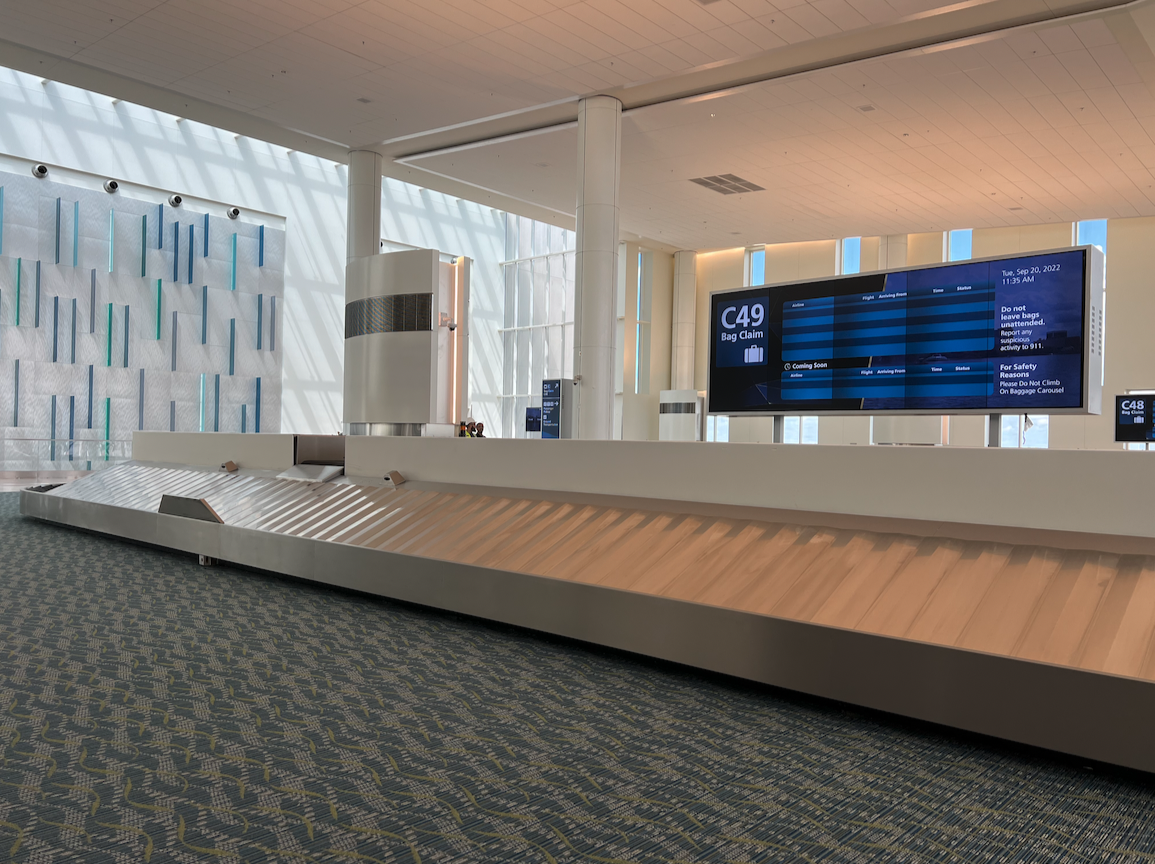 a conveyor belt in an airport