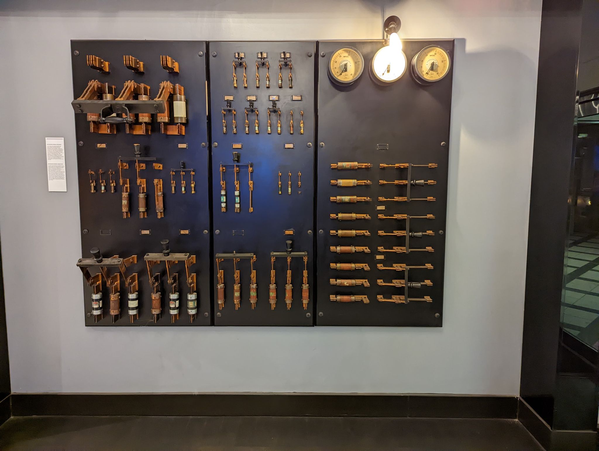 a wall with many different types of electrical components