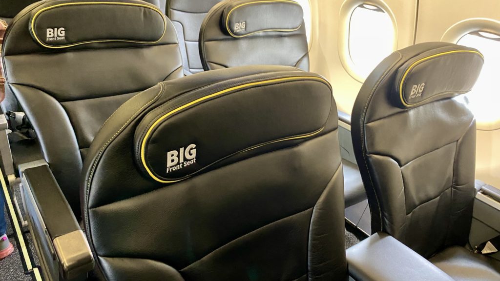 a black seats in a plane