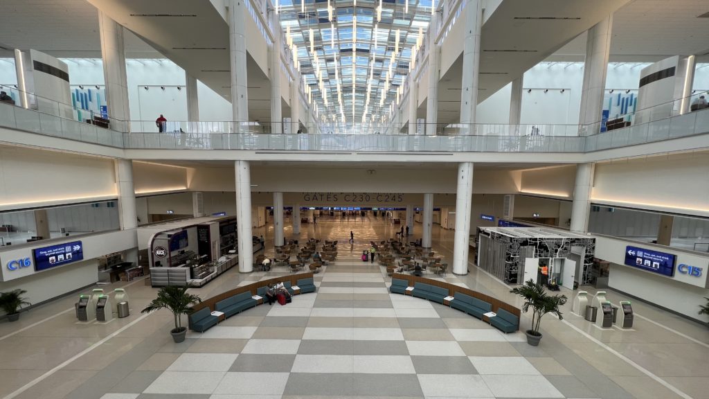 a large building with a checkered floor and a large walkway