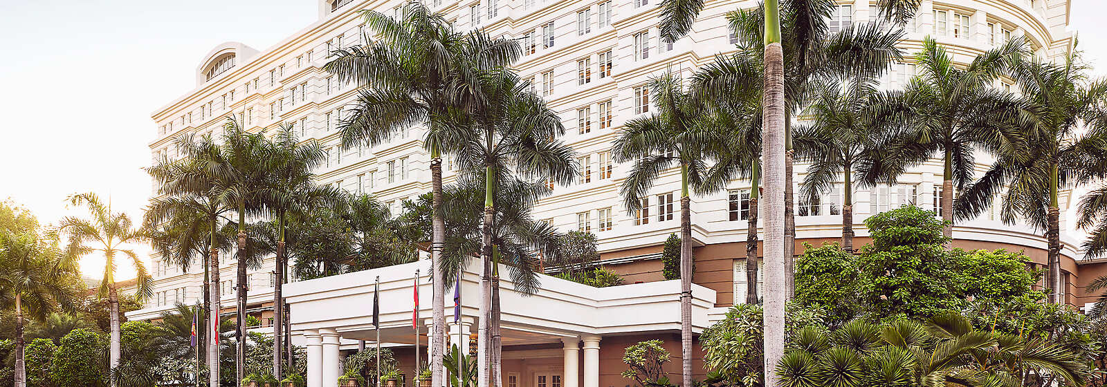 a building with palm trees