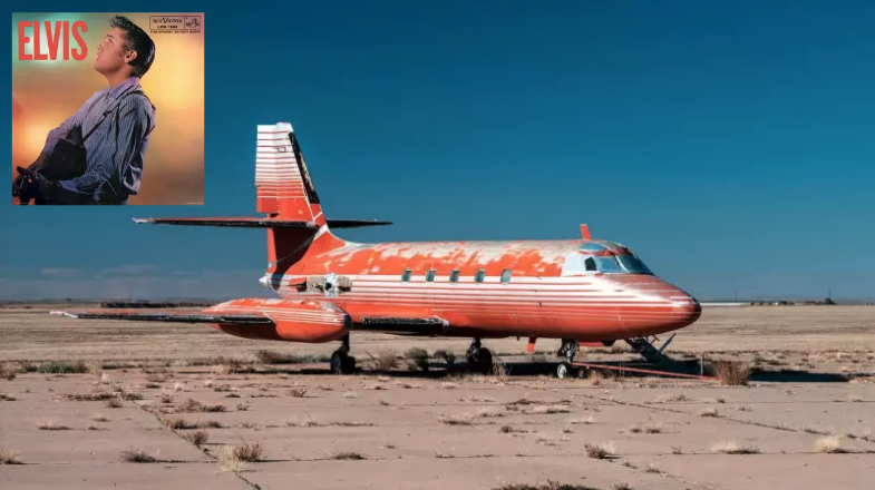 an orange airplane in the desert