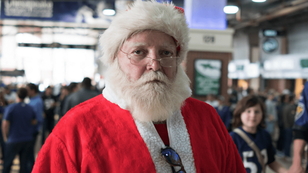 a man wearing a santa garment