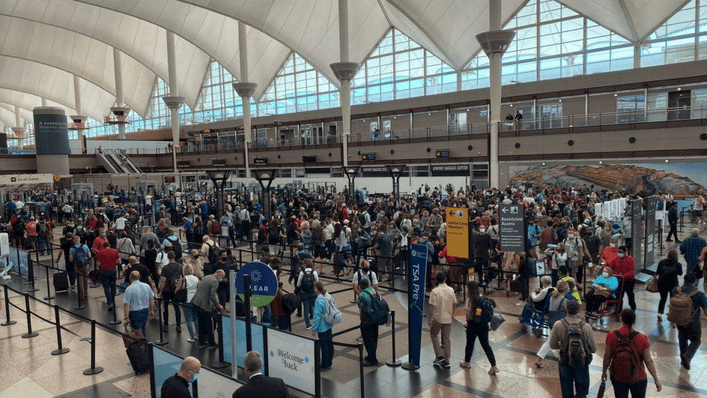 a large group of people in a terminal