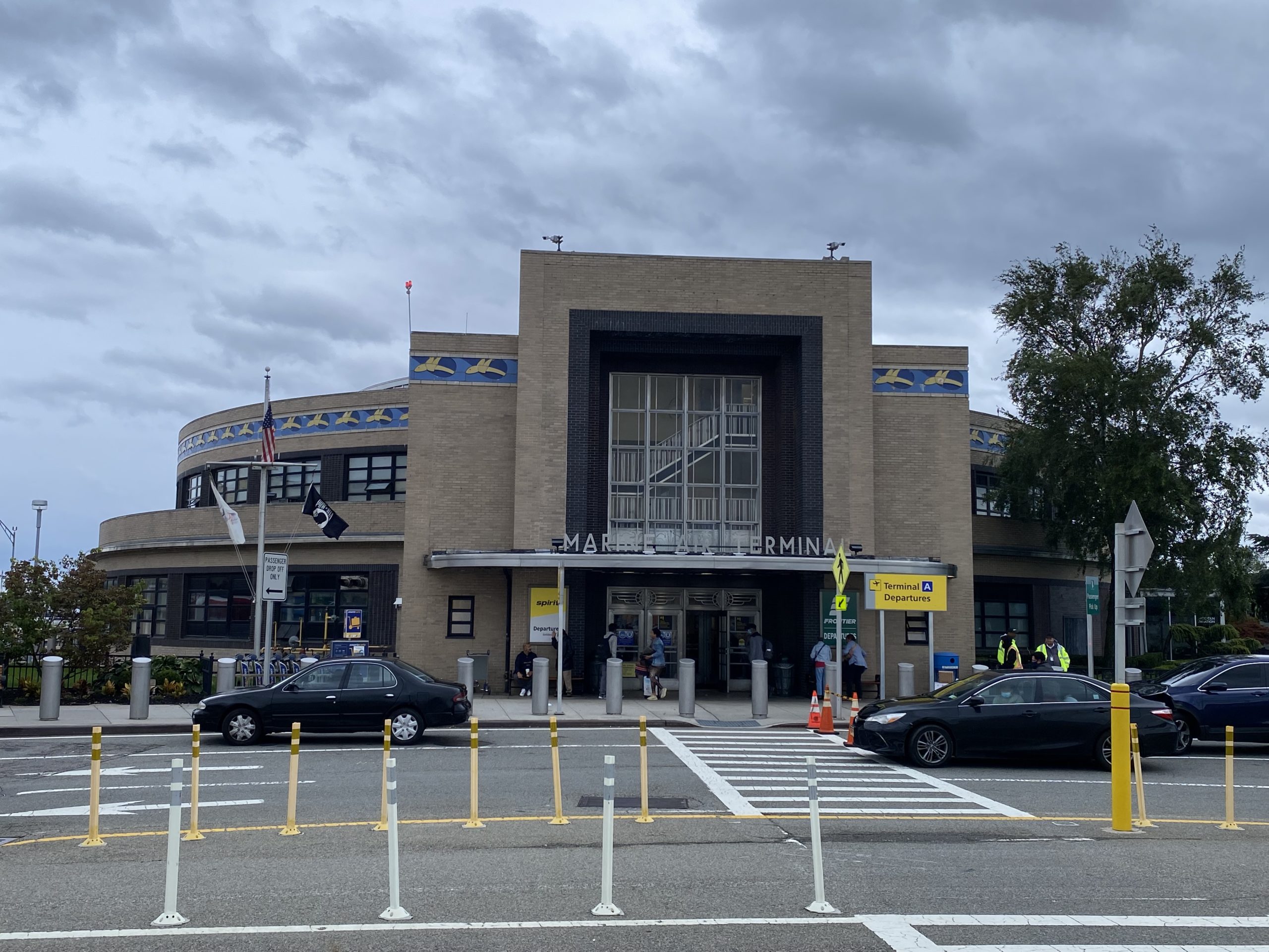 a building with cars parked in front of it