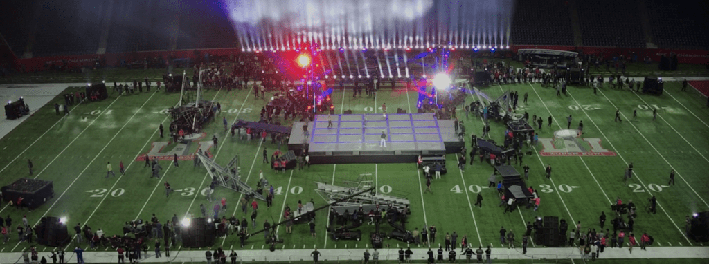 a large crowd of people on a football field