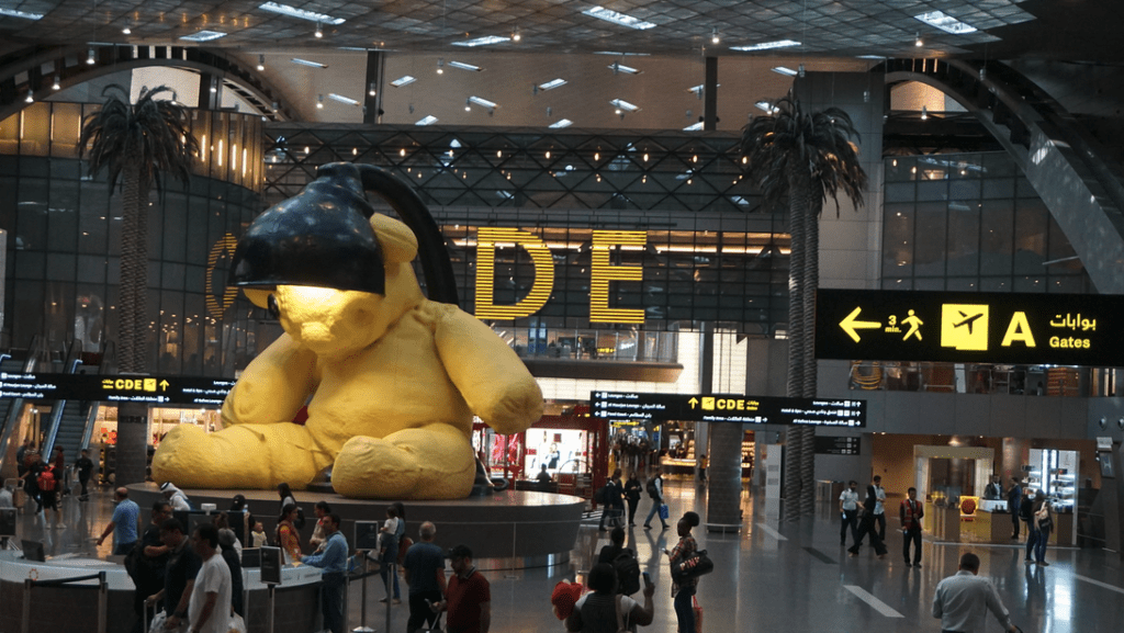 a large stuffed bear in a large building