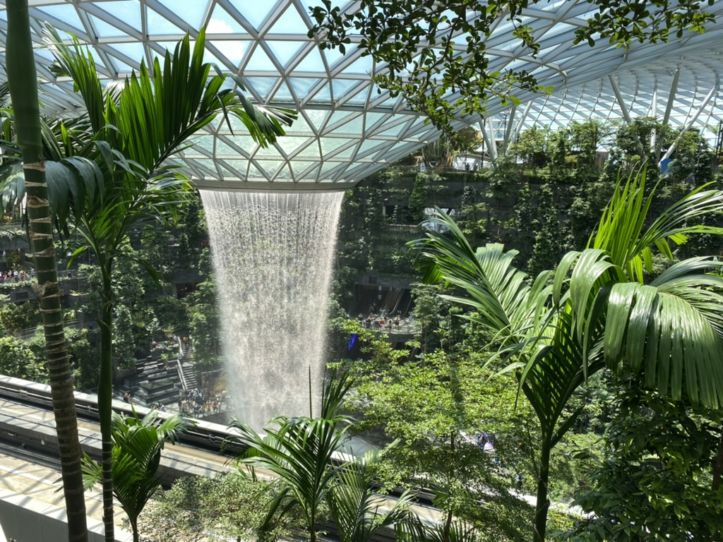 a waterfall in a glass dome