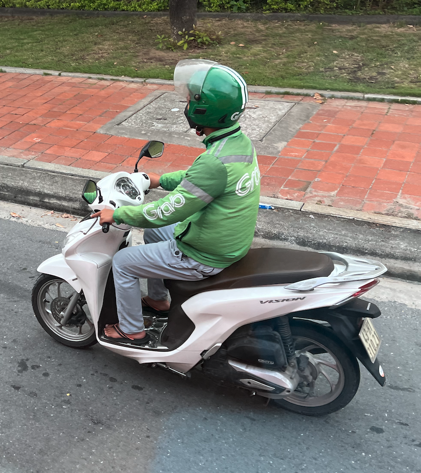 a man riding a scooter