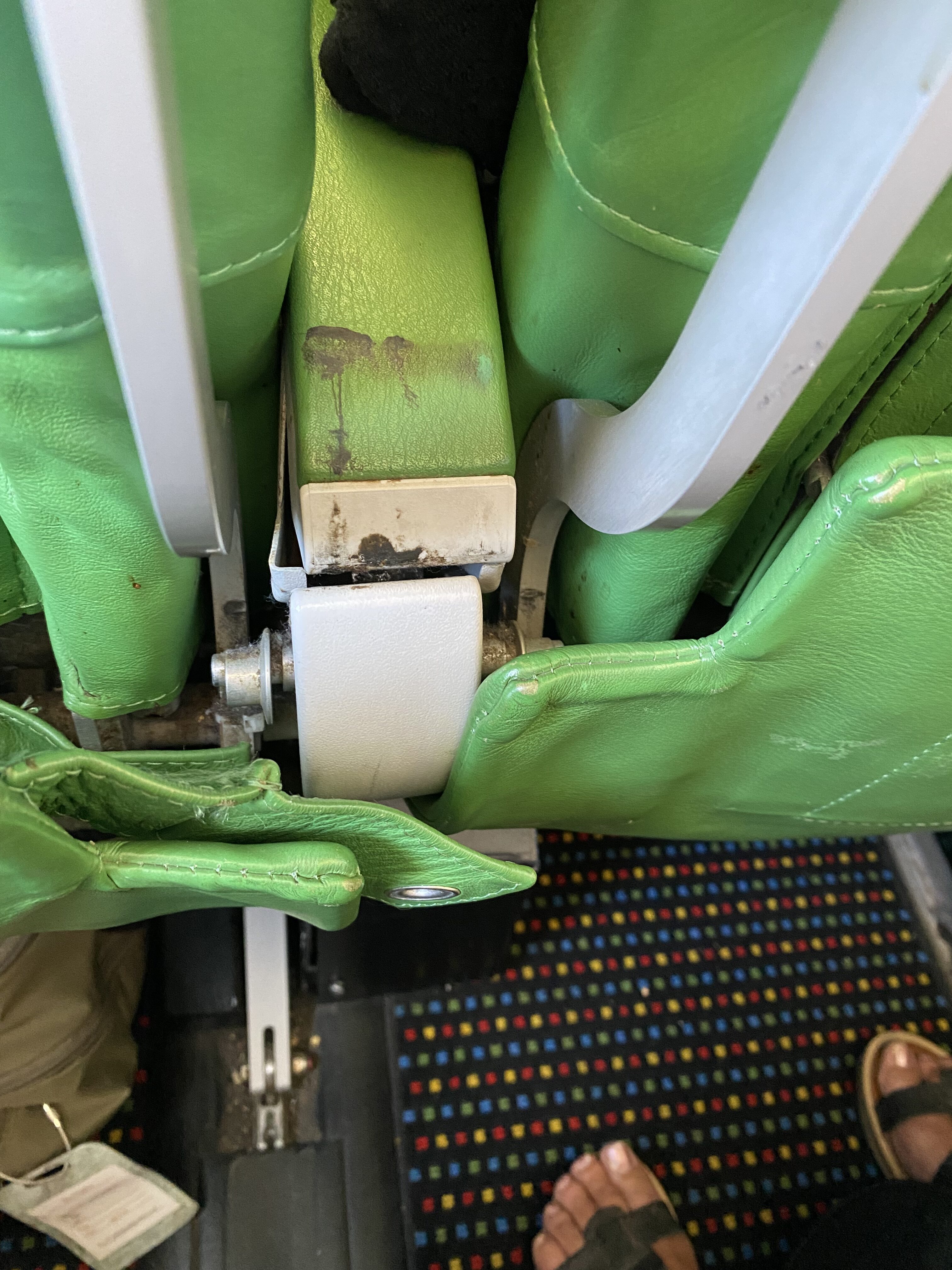 green seats on an airplane