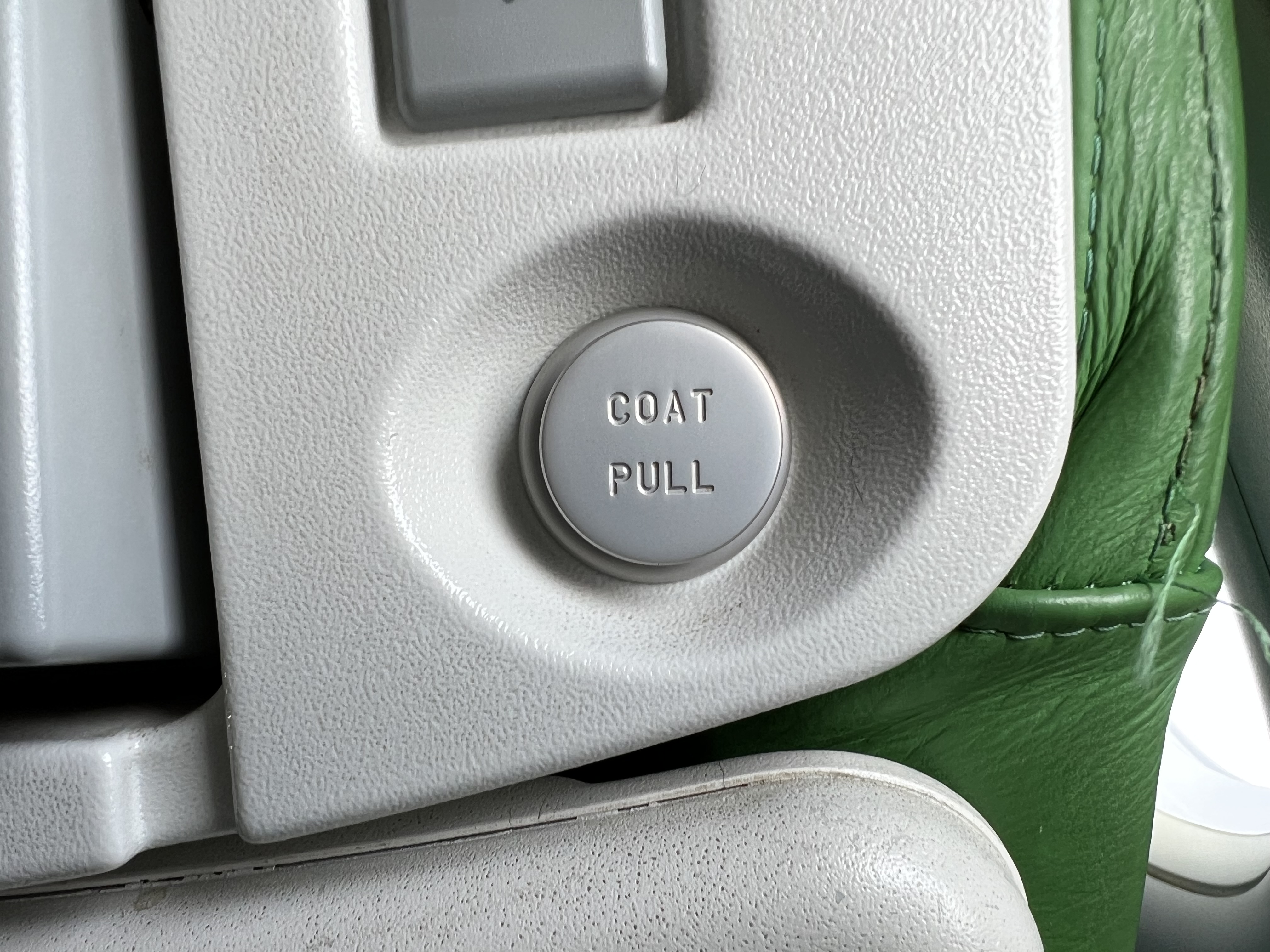 a button on a seat