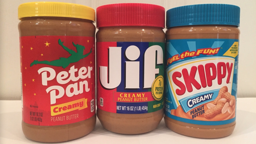 a group of jars of peanut butter