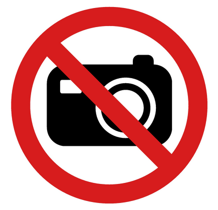 a no camera sign