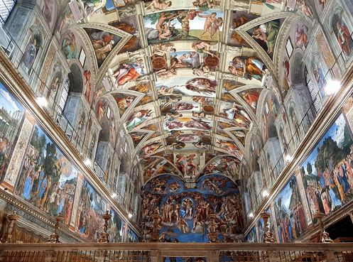 a ceiling with paintings on the walls with Sistine Chapel in the background