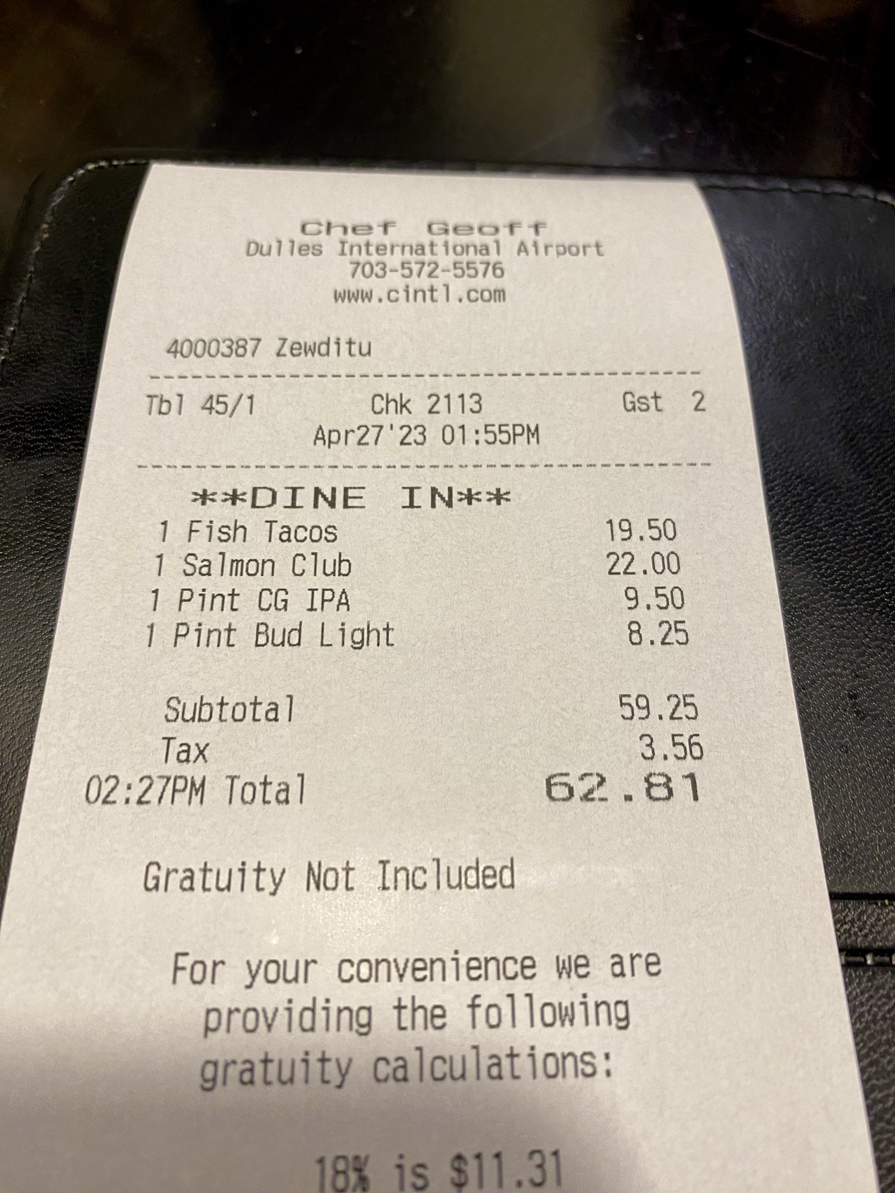 a receipt on a leather cover