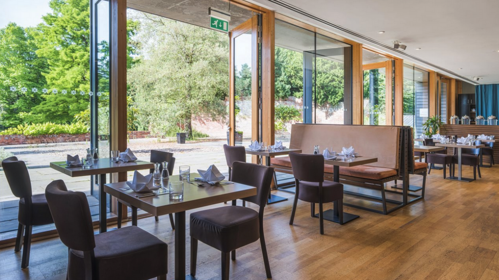 a restaurant with tables and chairs