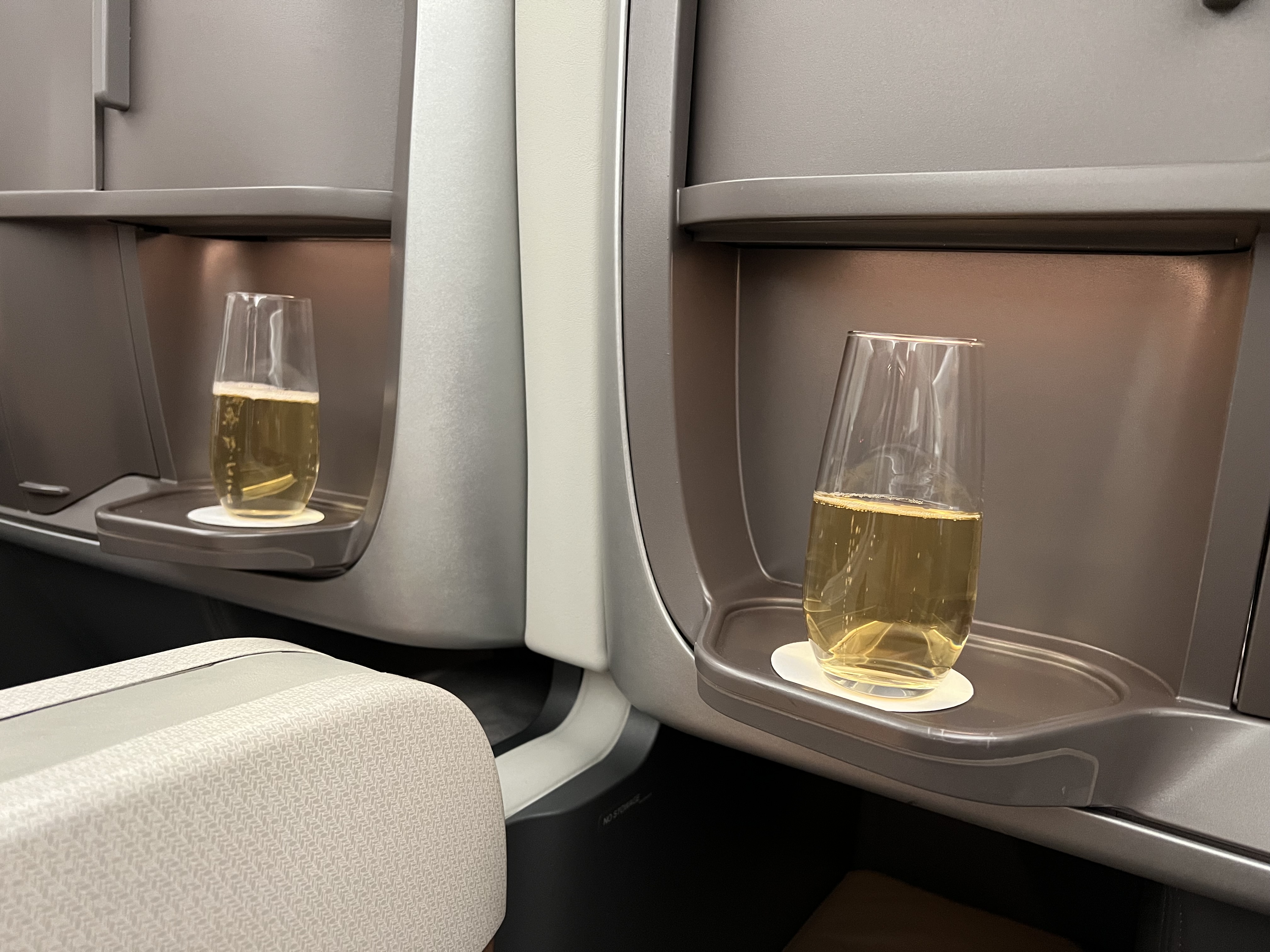 two glasses of wine on a tray