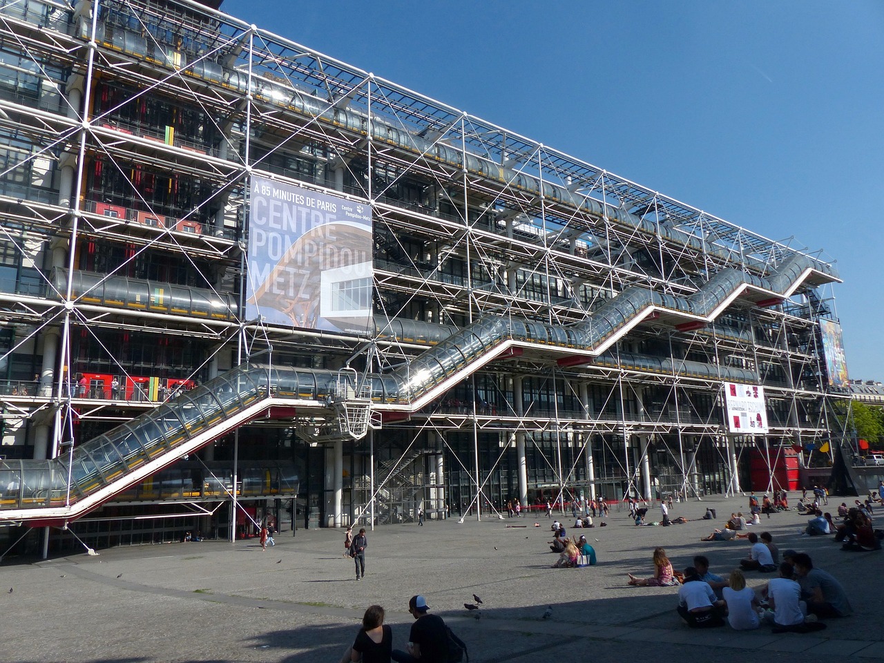 Centre Georges Pompidou with stairs and people sitting on the ground