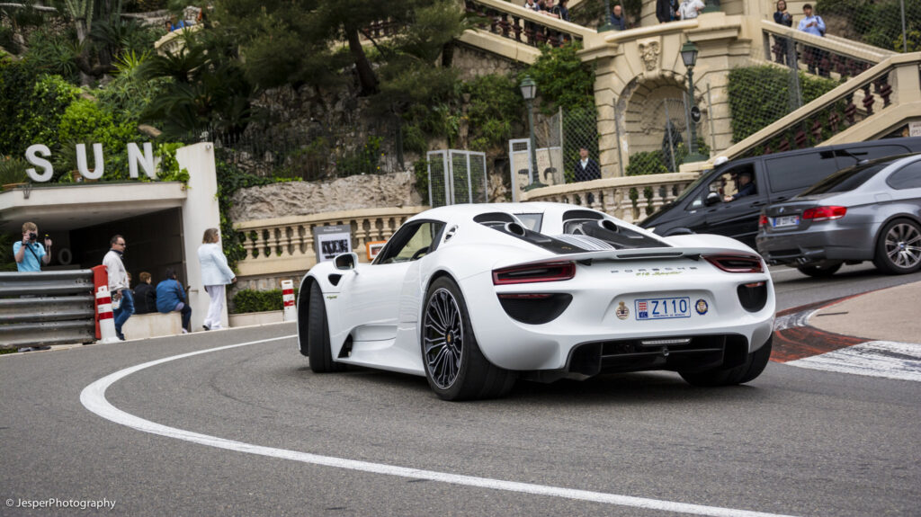 a white sports car on a road