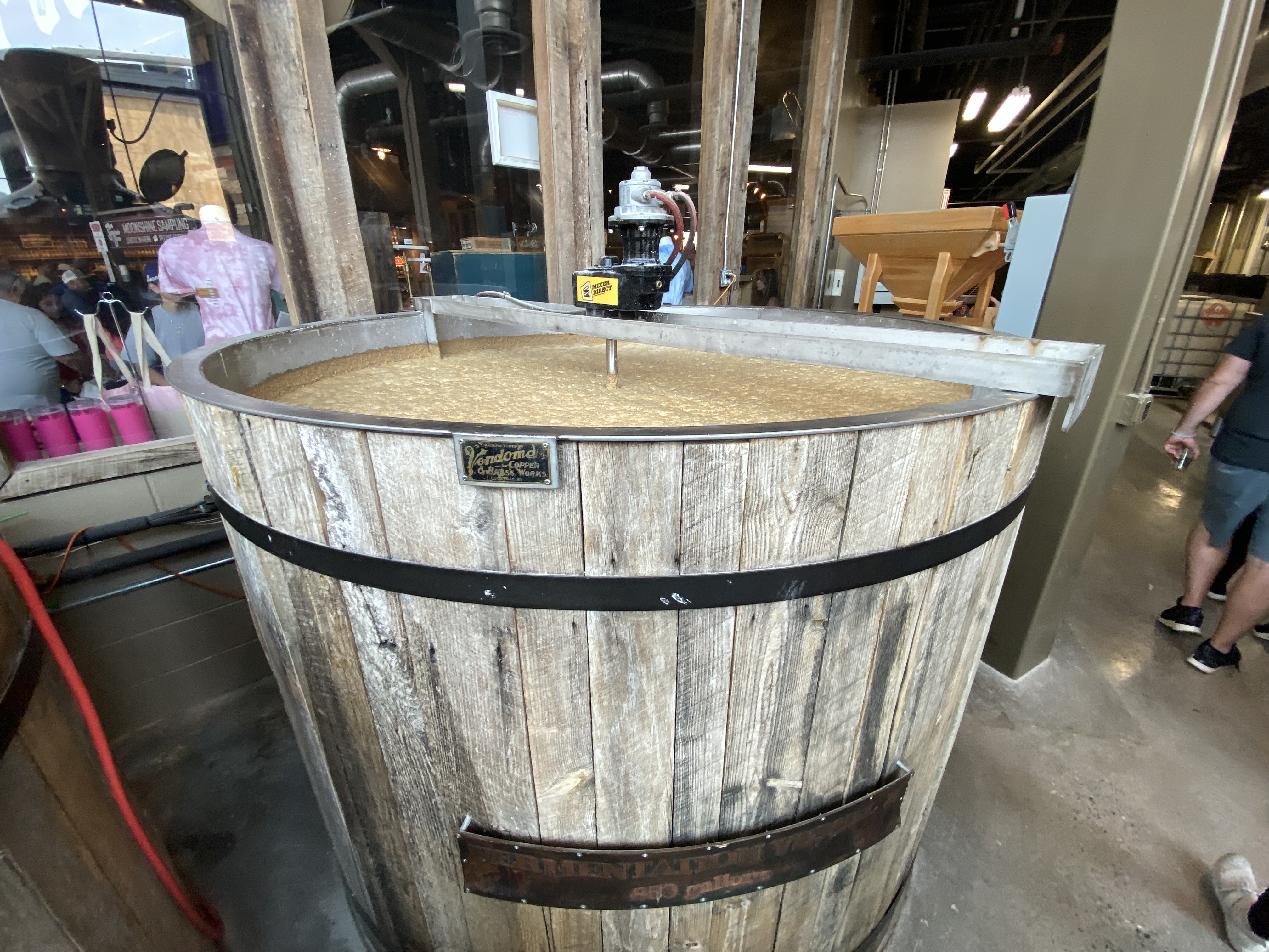 a wooden barrel with a black band around it