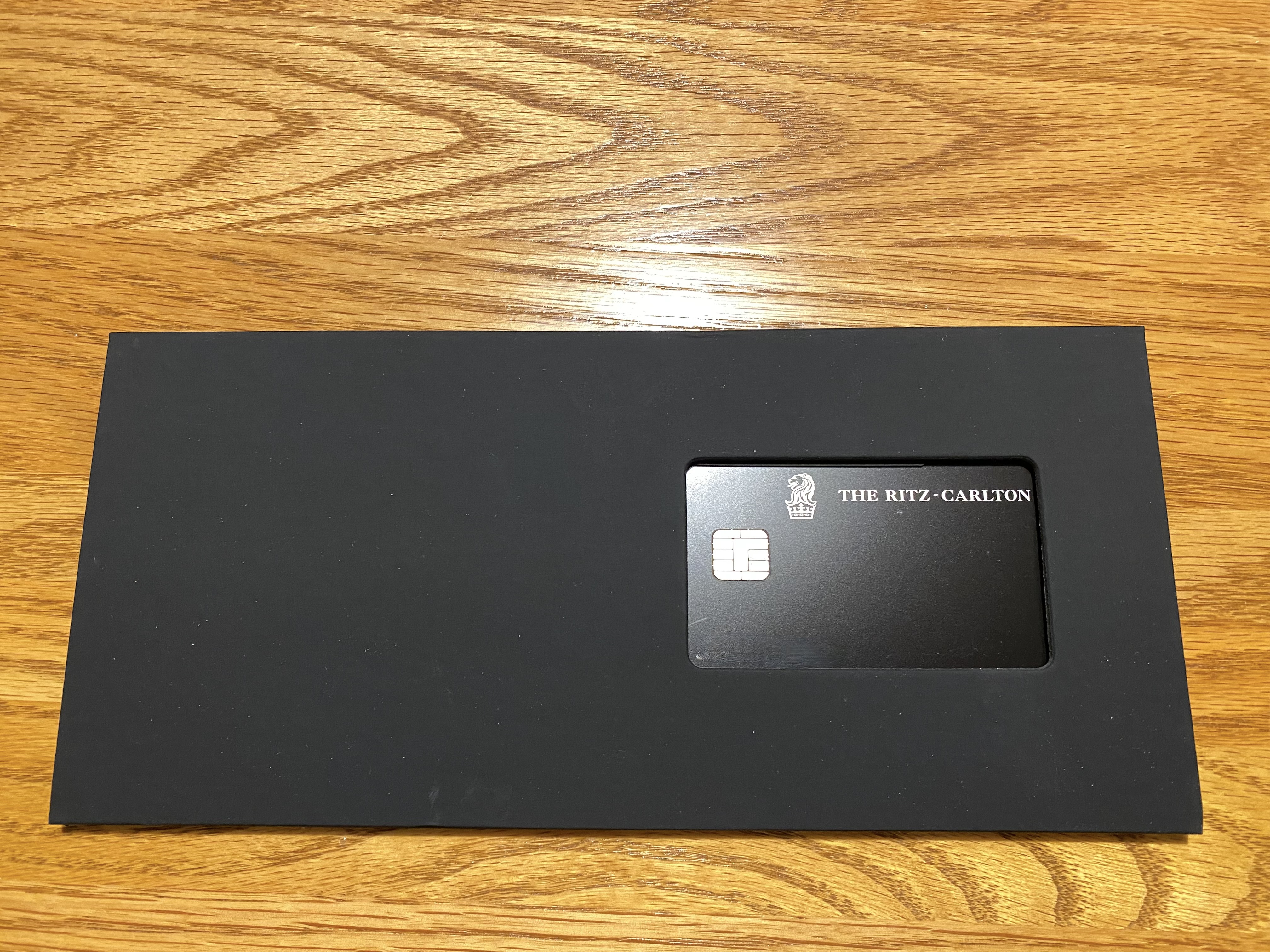 a black rectangular object with a logo on it