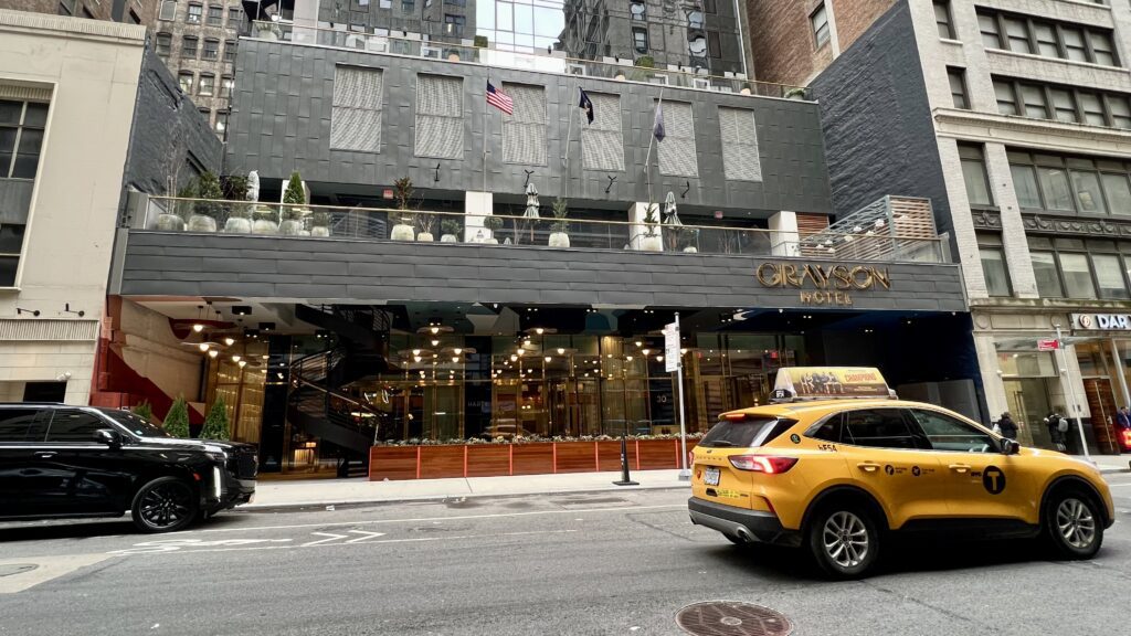 a yellow taxi on the street