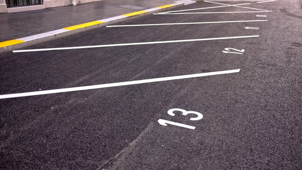 a parking lot with numbers painted on it