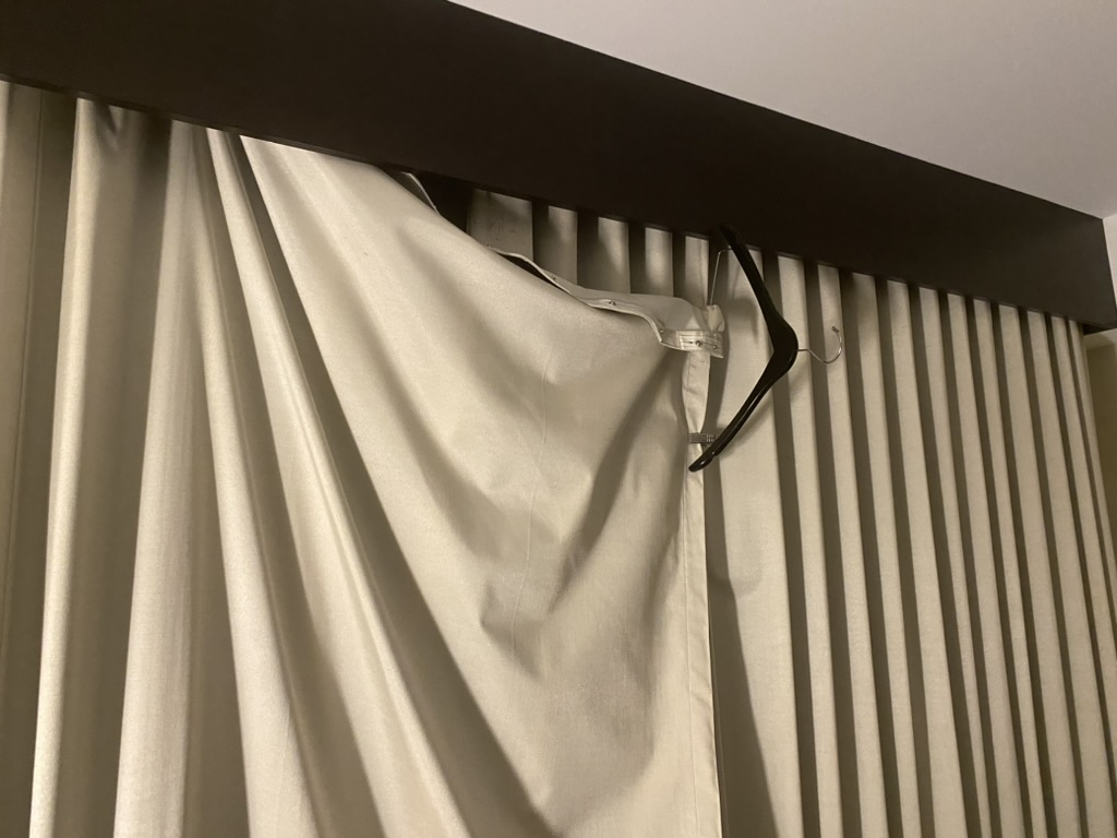 a curtain with a swinger on it