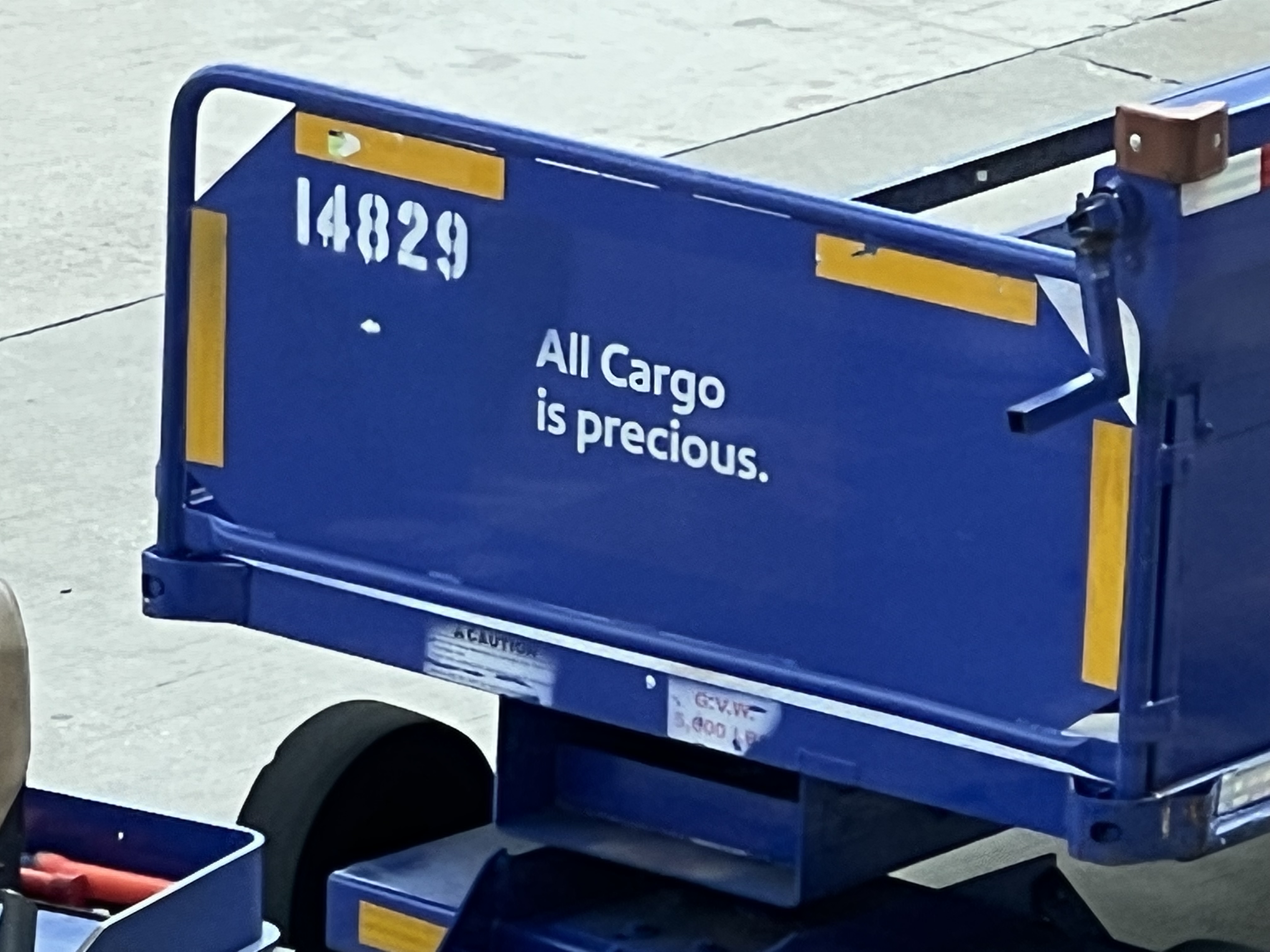 a blue trailer with white text on it