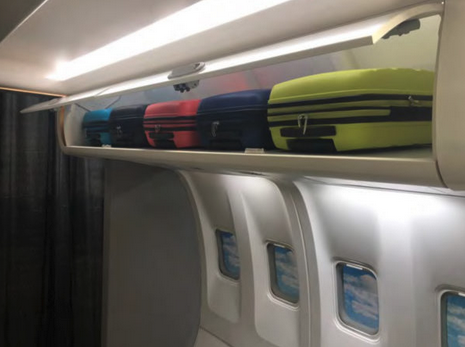 a row of luggage on a shelf