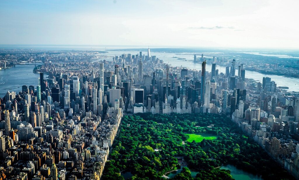 a city with many tall buildings and trees