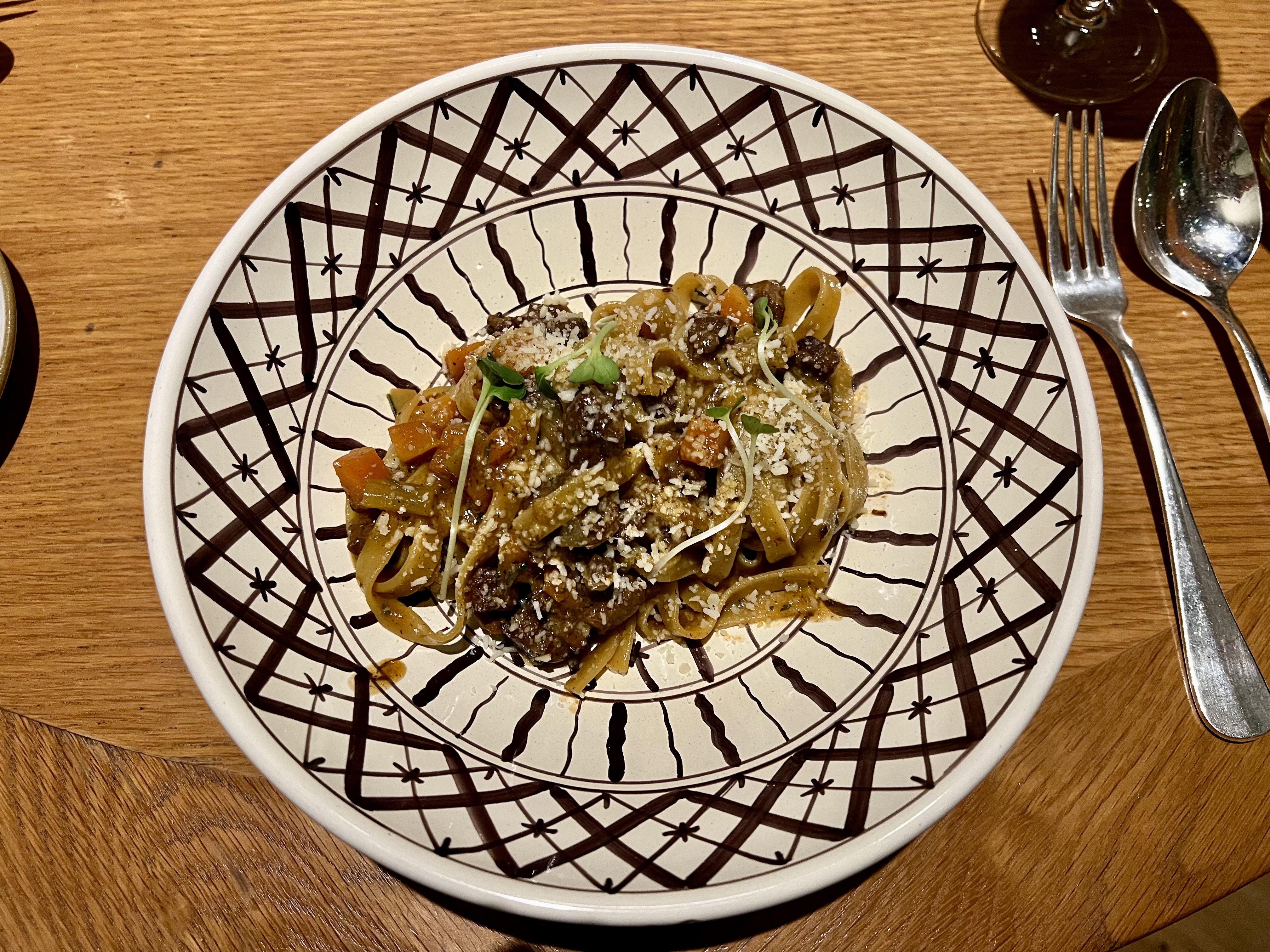 a plate of pasta with a fork