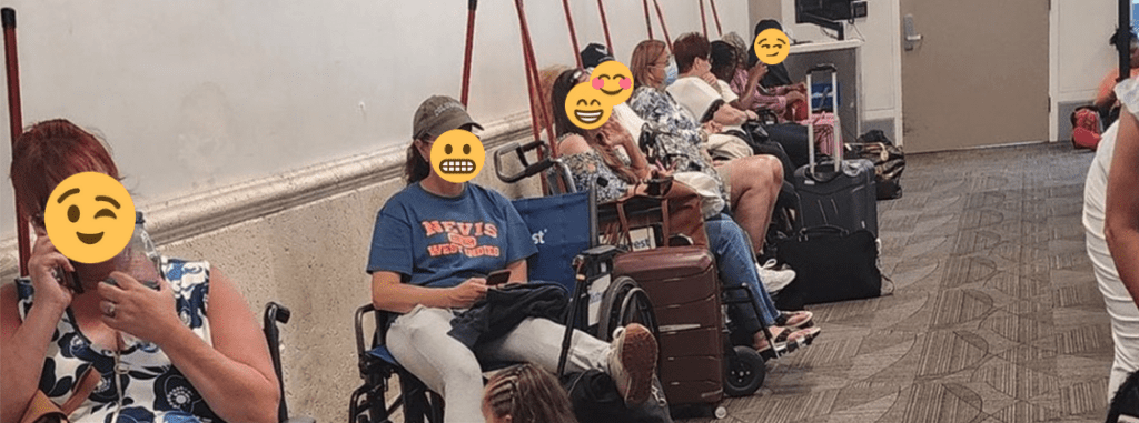 a group of people sitting in wheelchairs