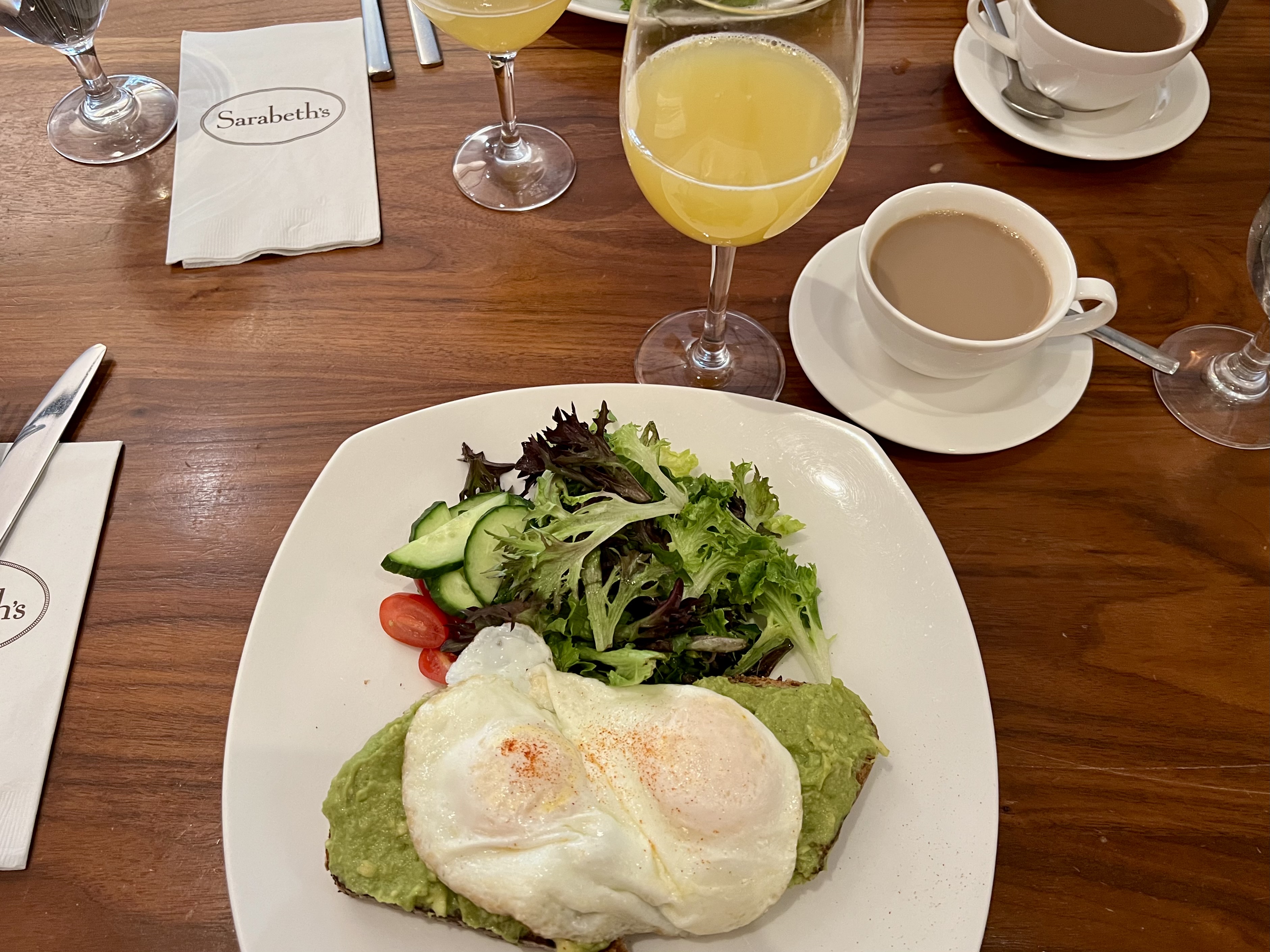 a plate of food and drinks on a table