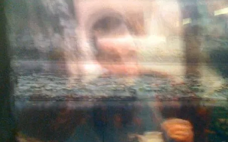 a blurry image of a person's face