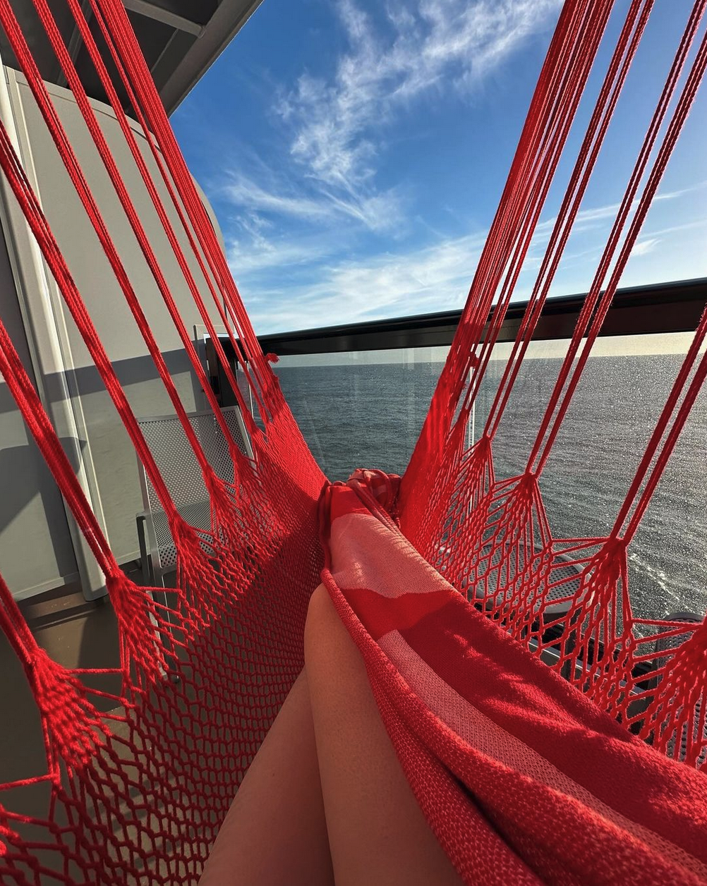 a person's legs in a hammock