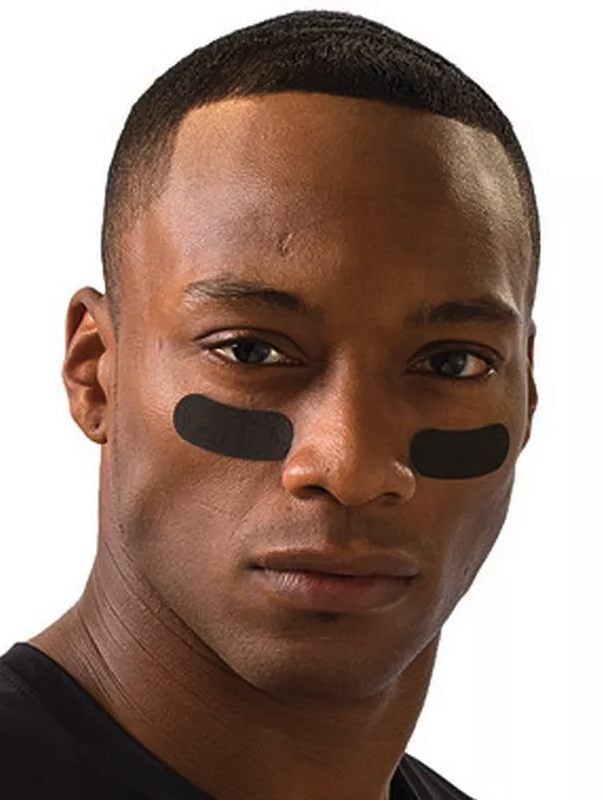a man with black tape on his face