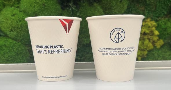 two white cups with text on them