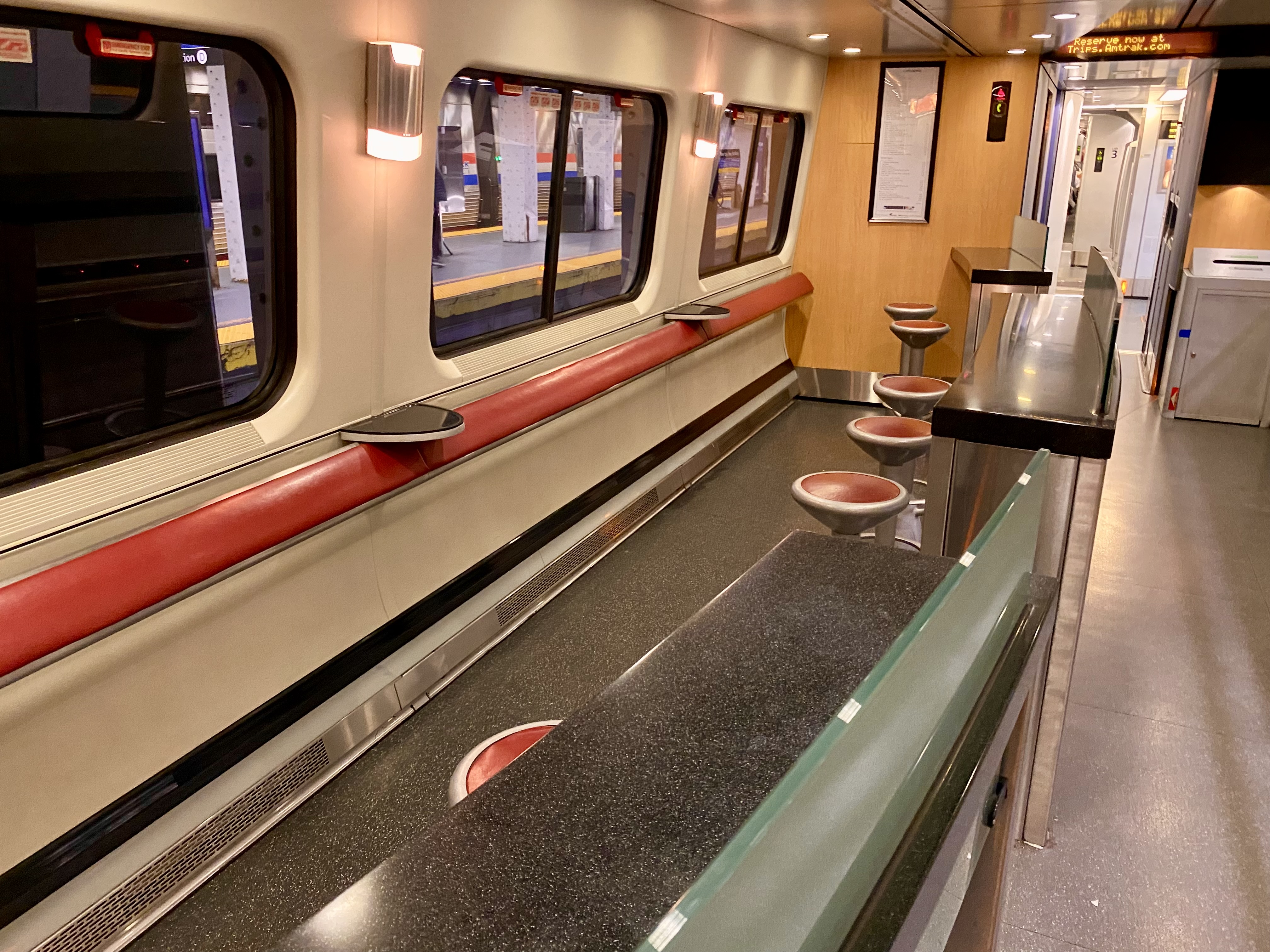 a train with seats and tables