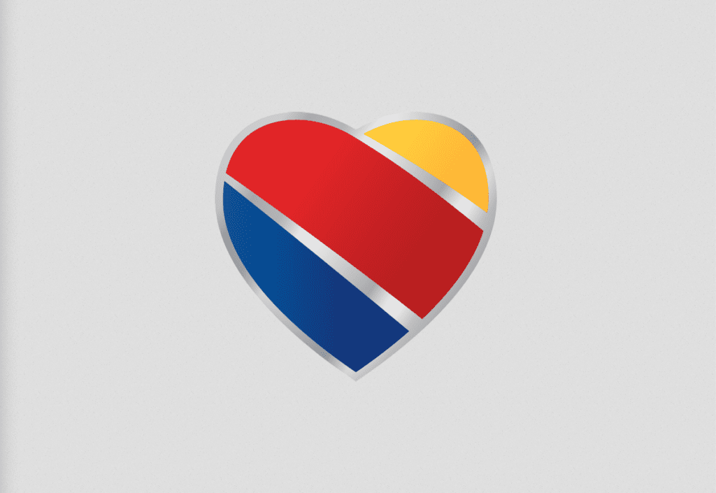 a heart shaped logo with a red blue and yellow stripe