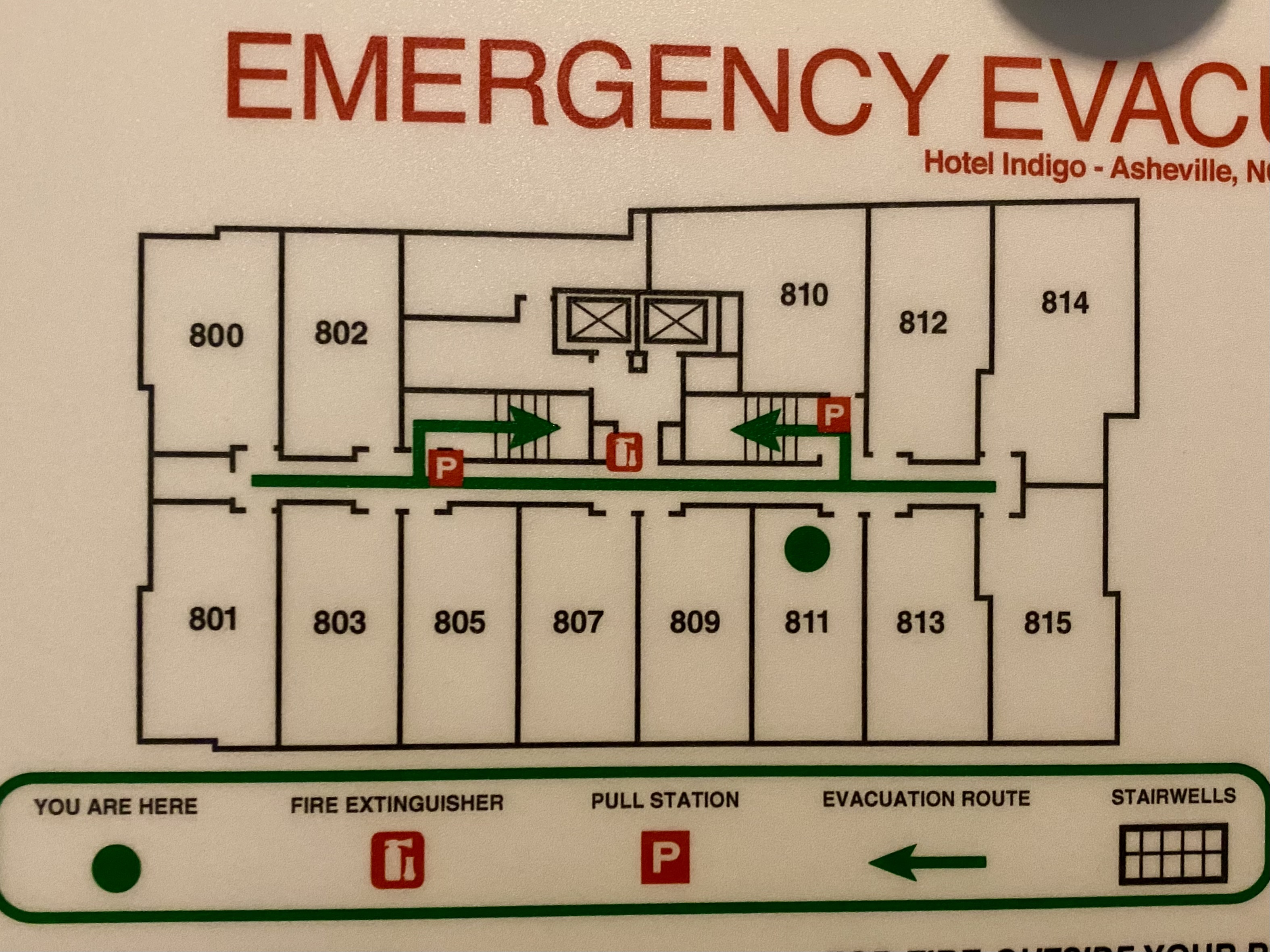 a sign with a map of the emergency exit
