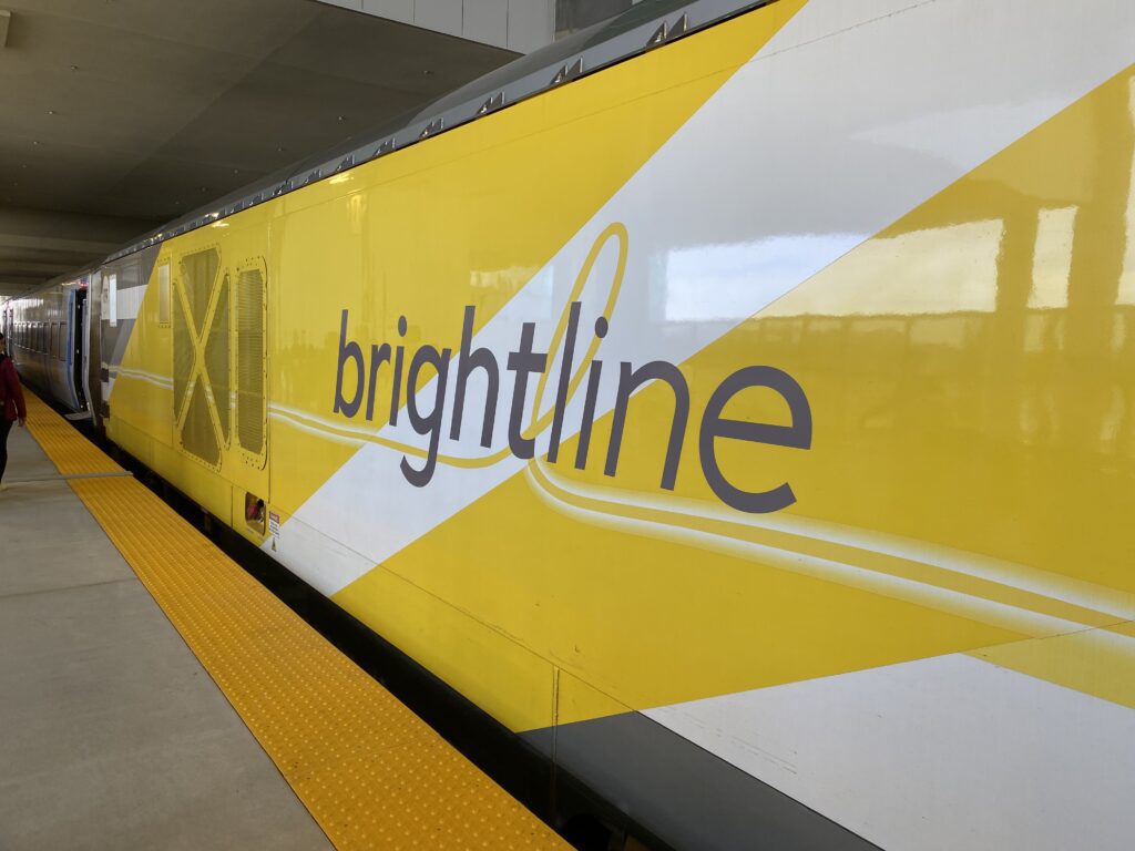 a yellow and white train