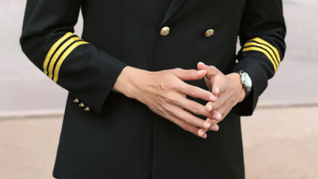 a close-up of a man in a uniform