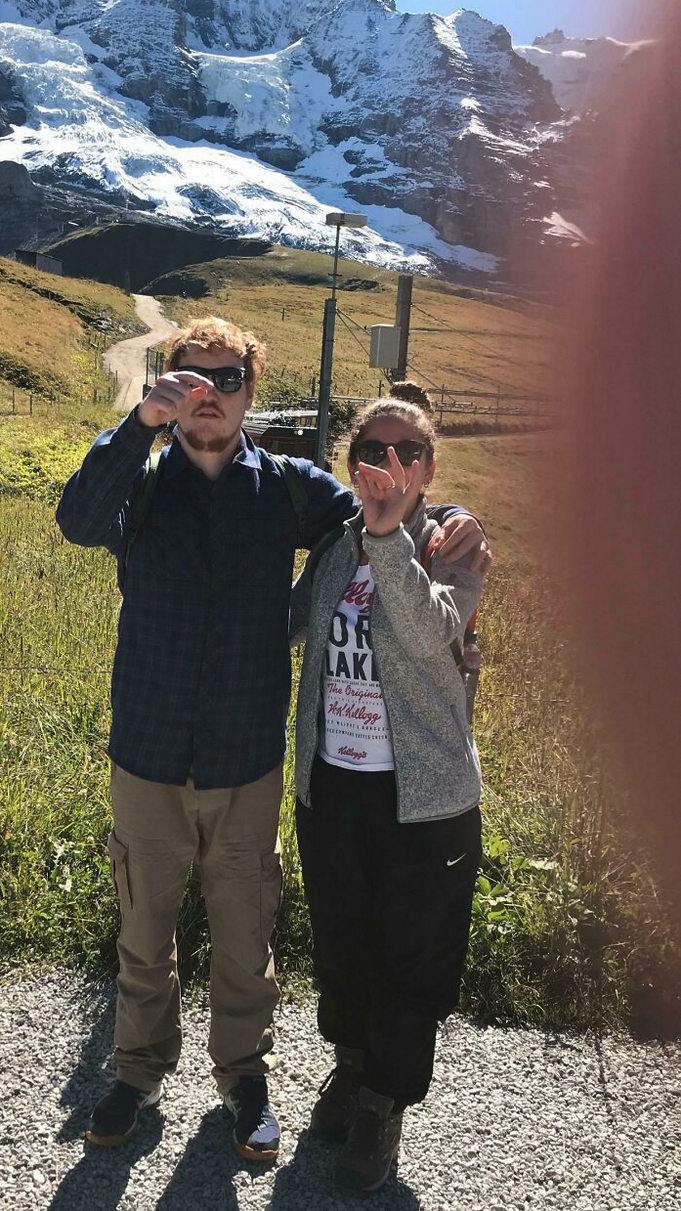 a man and woman posing for a picture