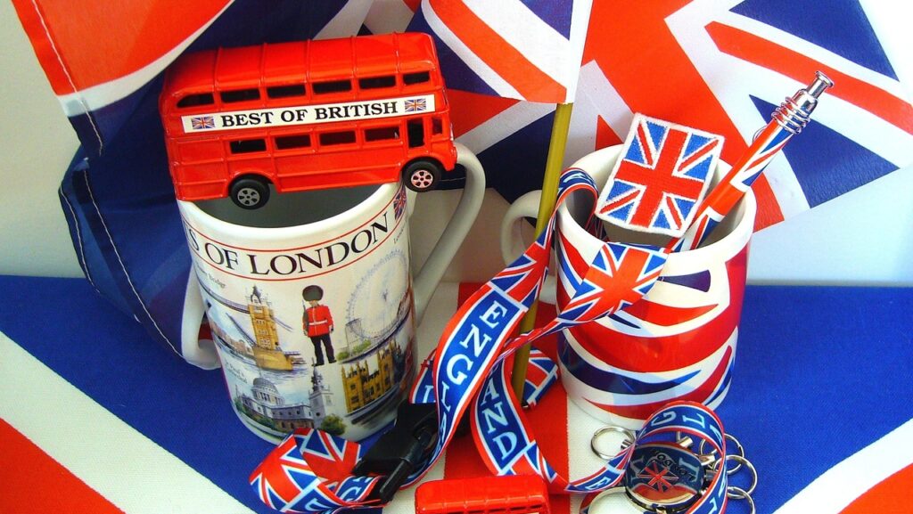 a mugs with a red bus and a keychain with flags