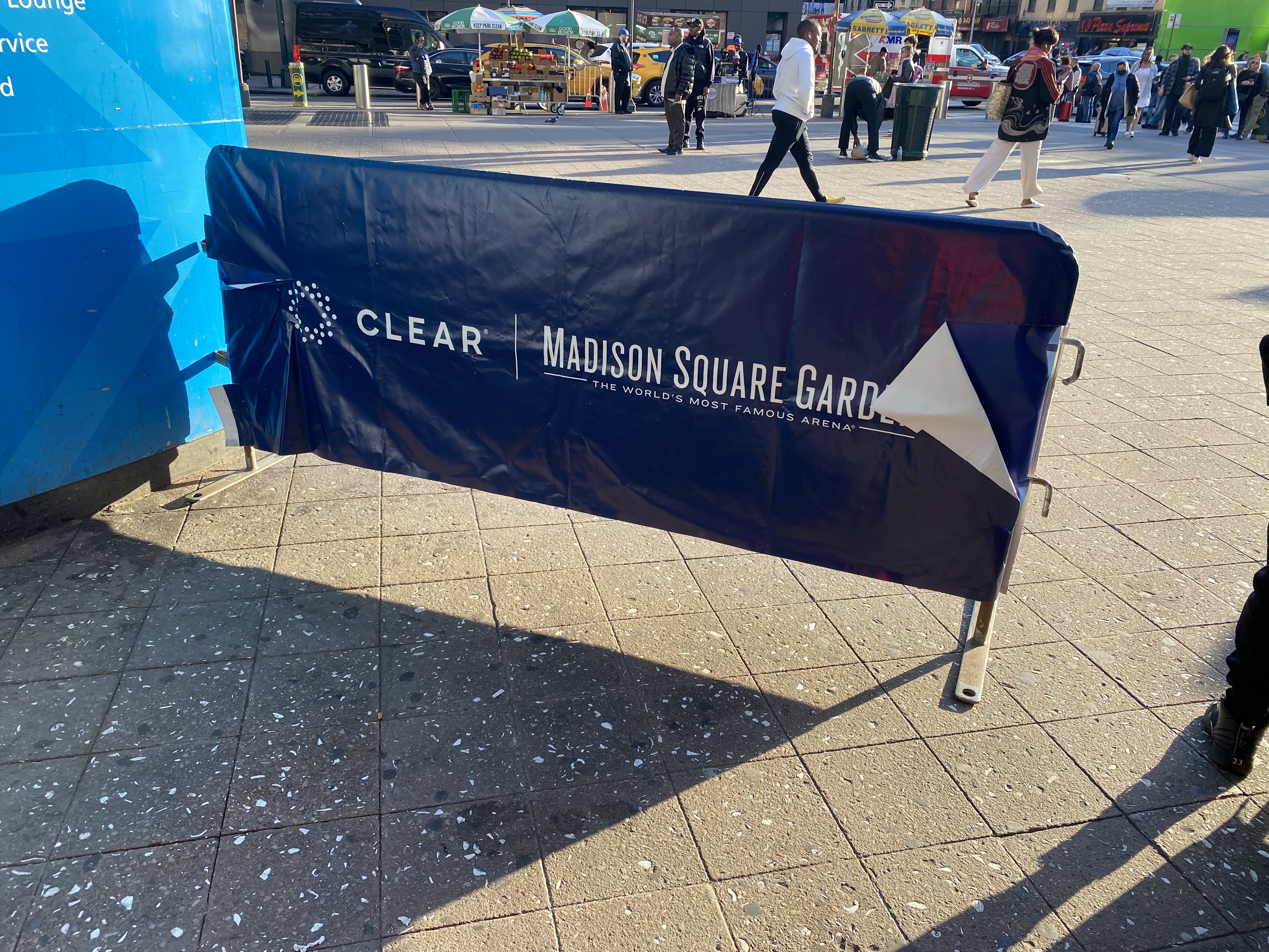 a blue tarp with white text on it