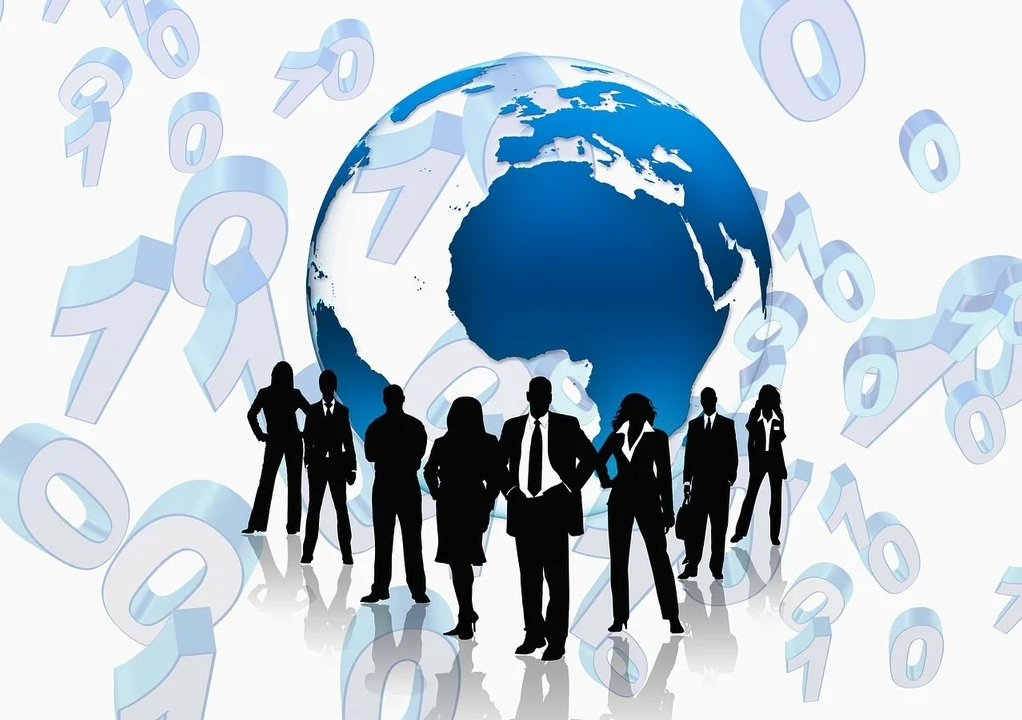 a group of people standing in front of a globe