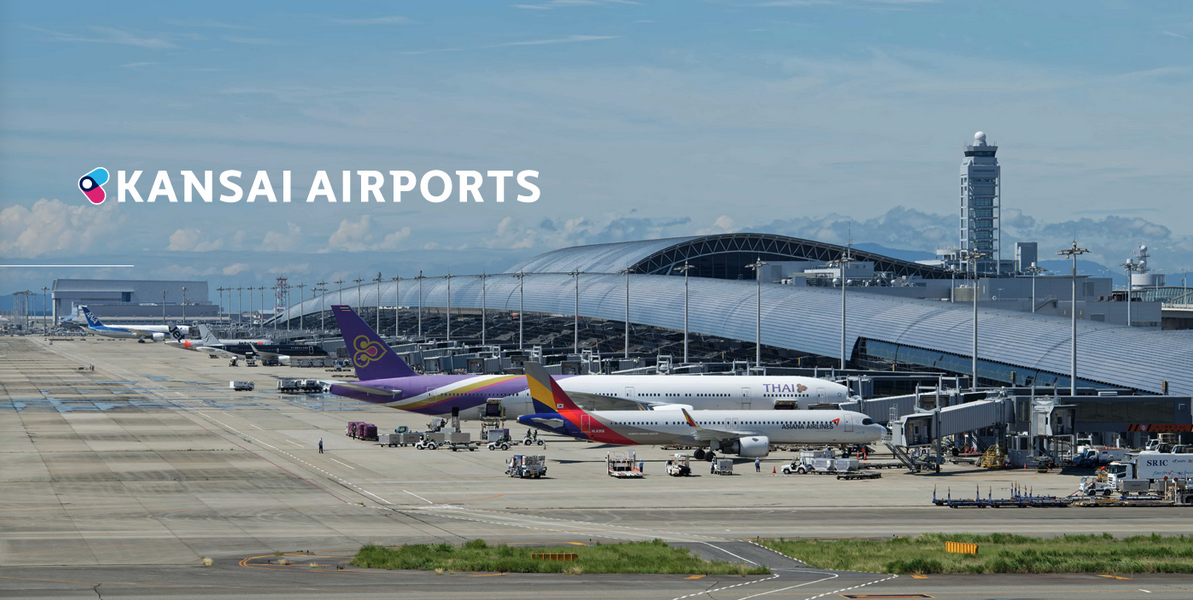 a group of airplanes at an airport